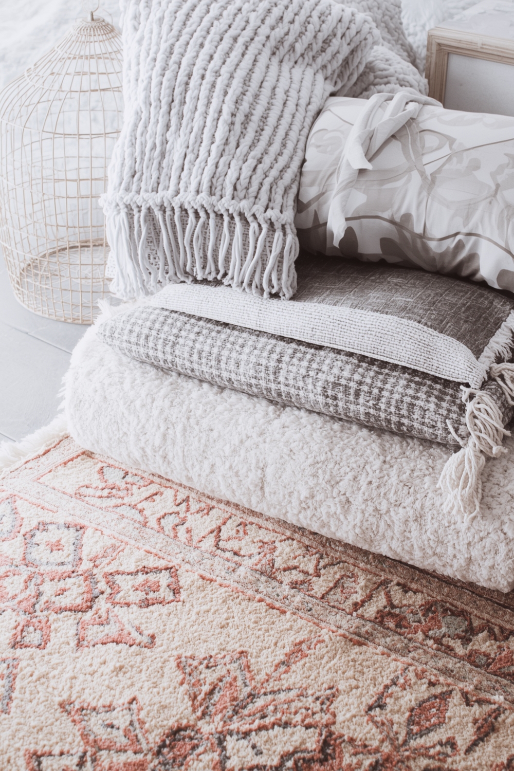 Layering Rugs & Cushions for Comfort